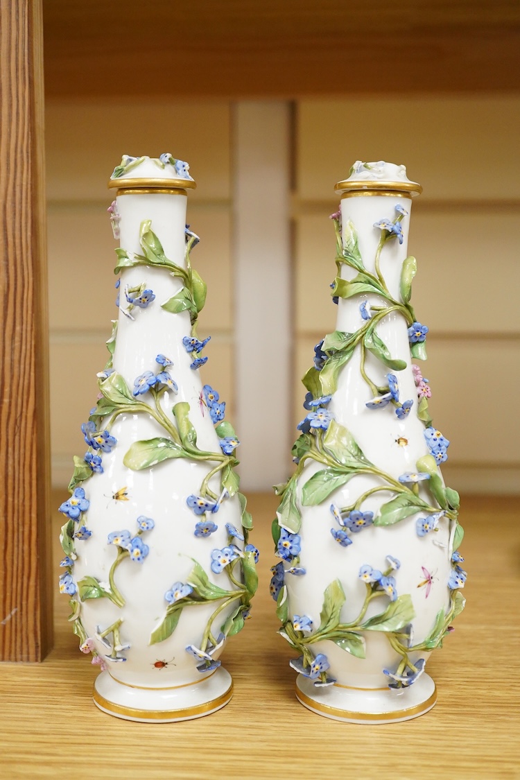 A pair of late 19th century Meissen flower encrusted vases and covers, 20cm high